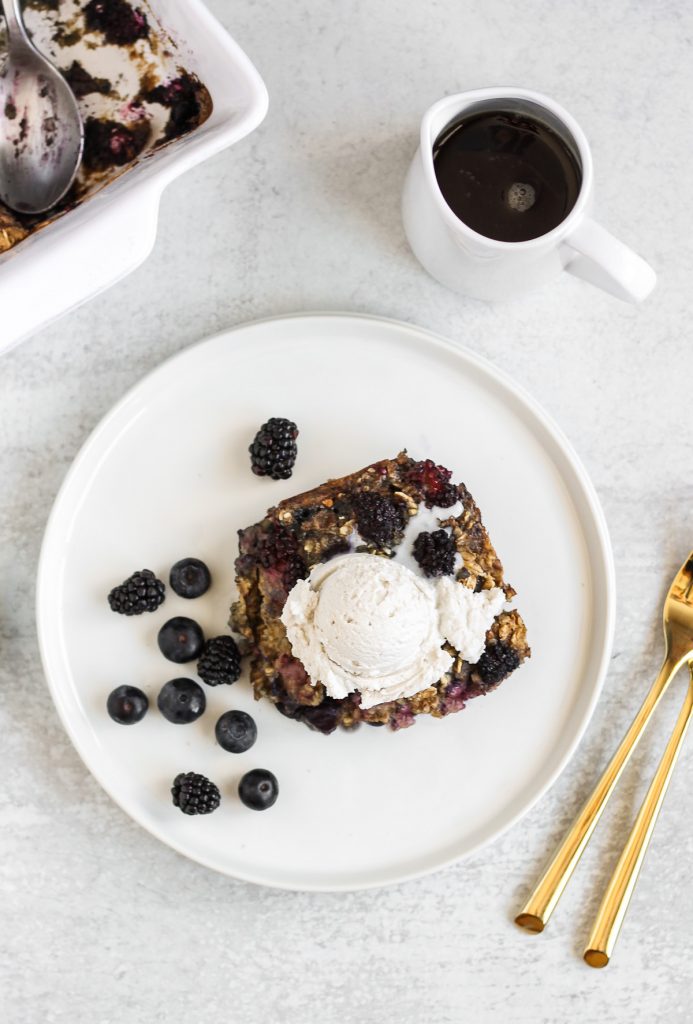 a piece of berry baked oatmeal on a white plate