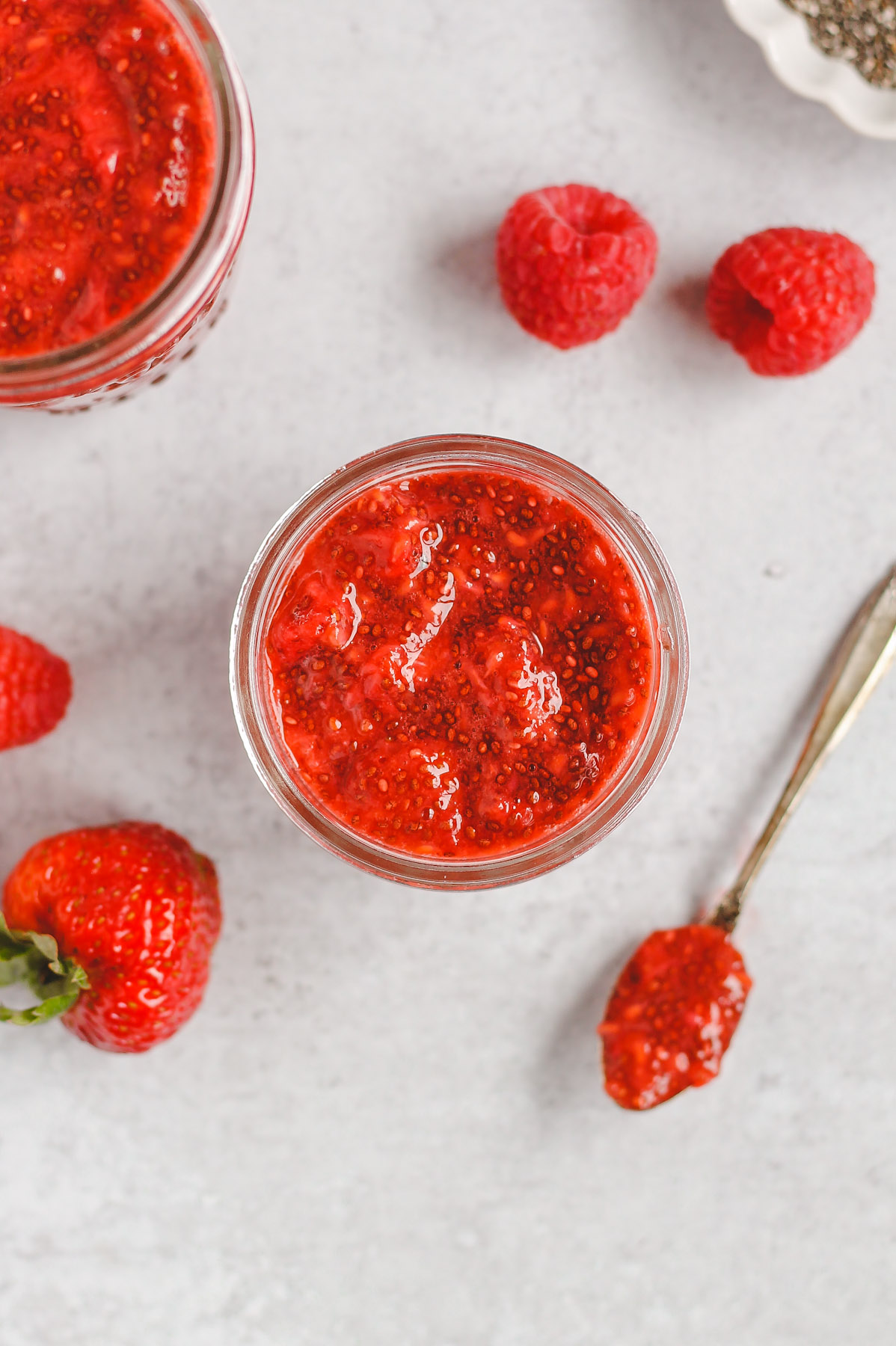 berry chia jam in an open mason jar