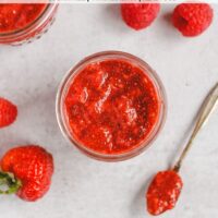 Pinterest pin showing an overhead view of jam in a mason jar