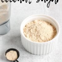 powdered coconut sugar in small white dish with text overlay for Pinterest