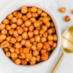 Small bowl filled with roasted chickpeas.