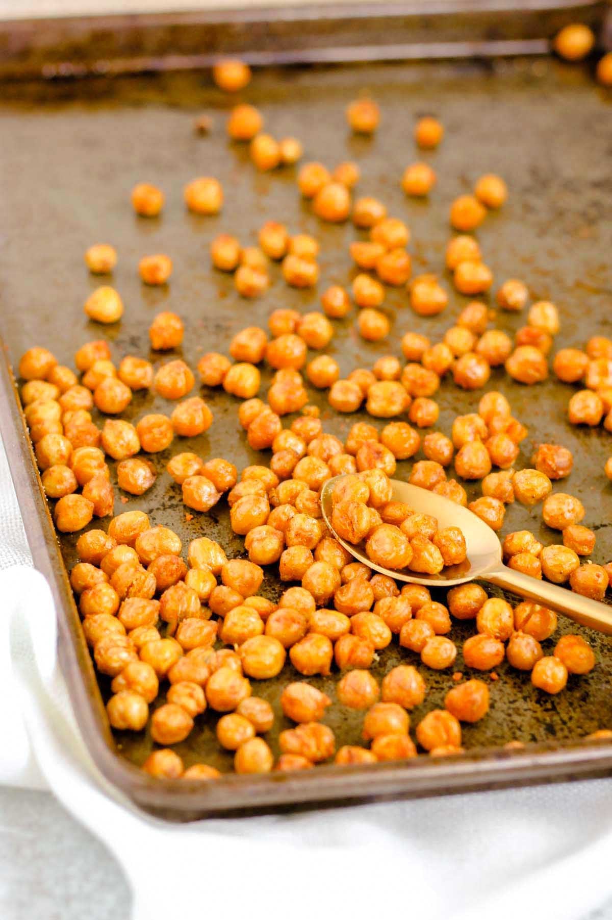 Roasted chickpeas on a cookie sheet.
