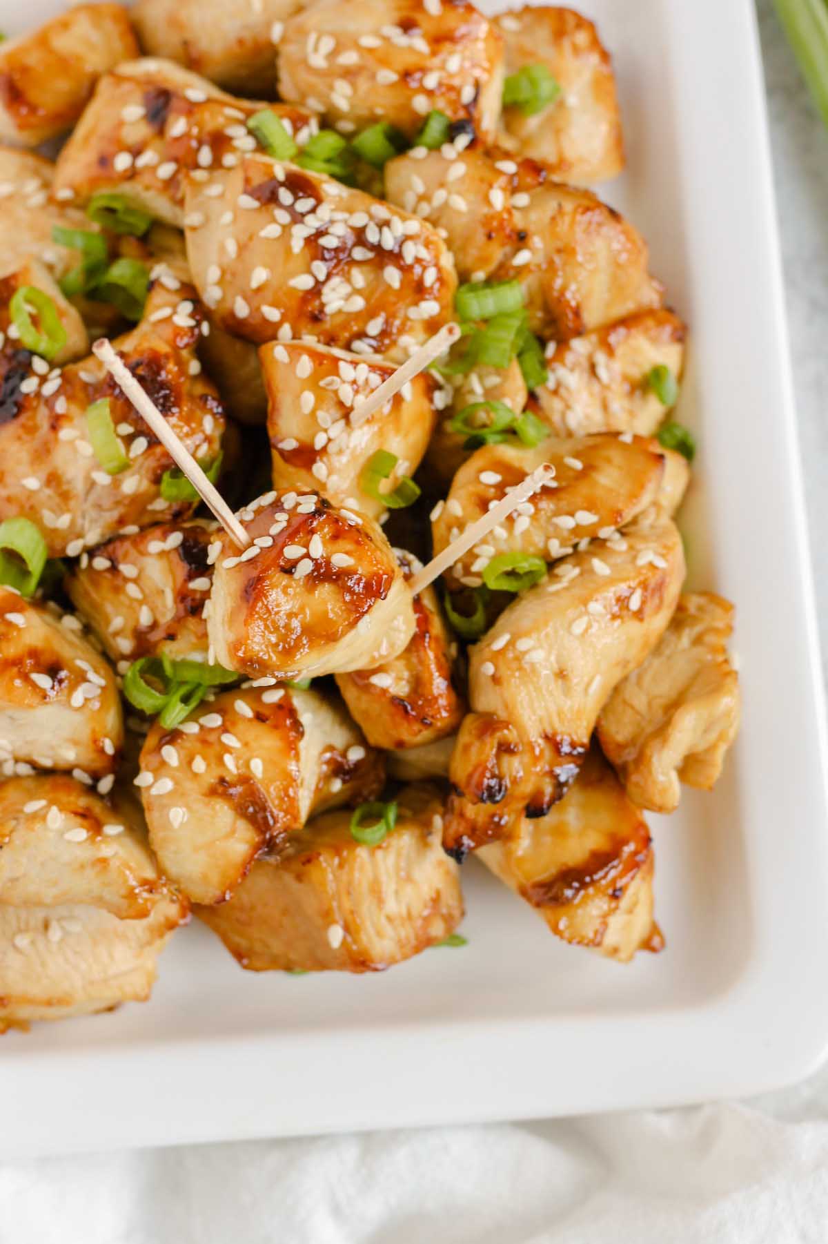 Close up of air fried teriyaki chicken pieces.
