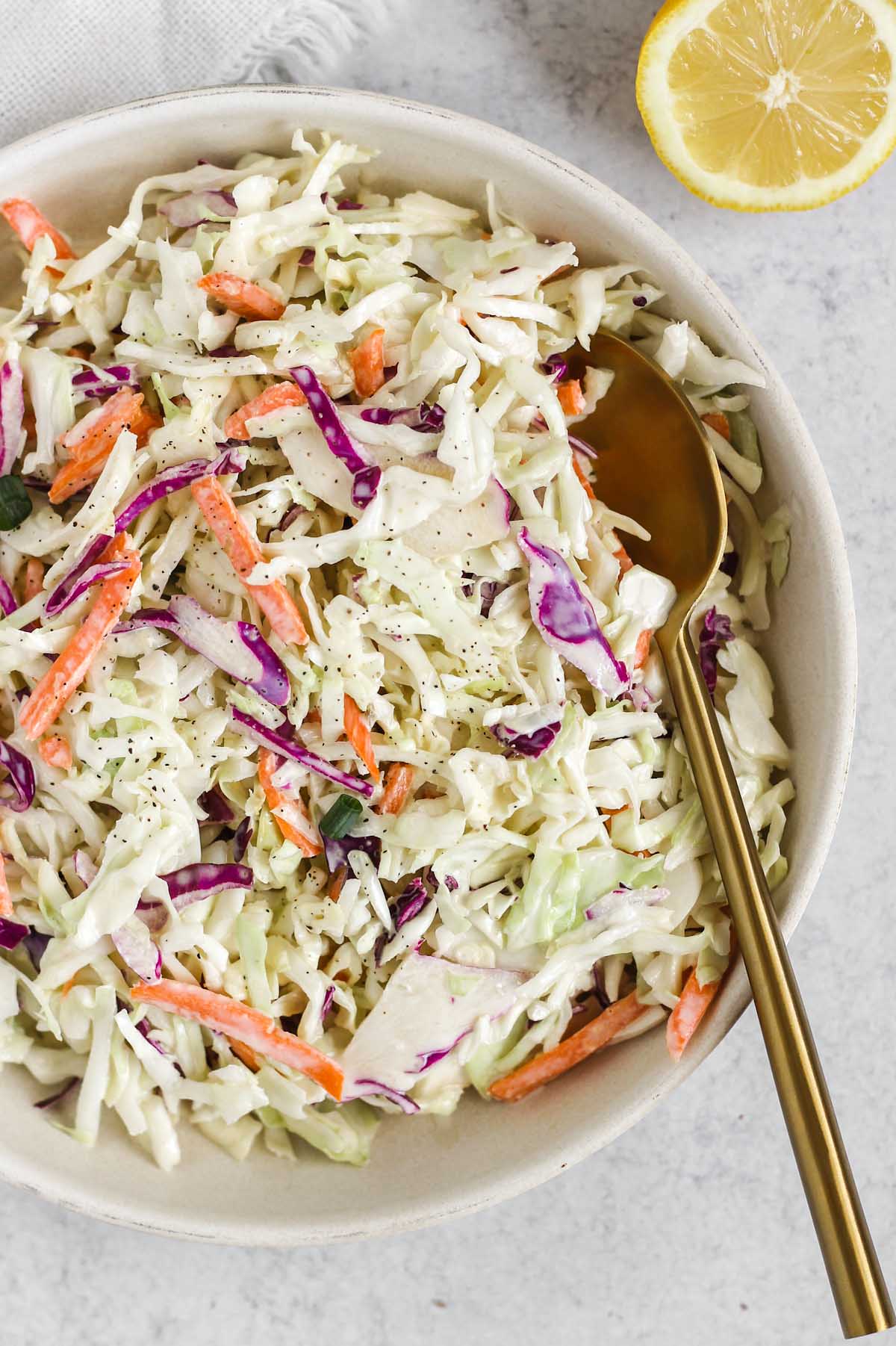 Close up of Whole30/Paleo coleslaw in a serving dish.