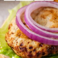Air fried turkey patty with text overlay "tasty and juicy air fryer turkey burgers."
