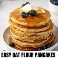Stacked pancakes with text overlay "easy oat flour pancakes."