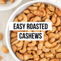 Roasted cashews in a bowl with text overlay "easy roasted cashews."