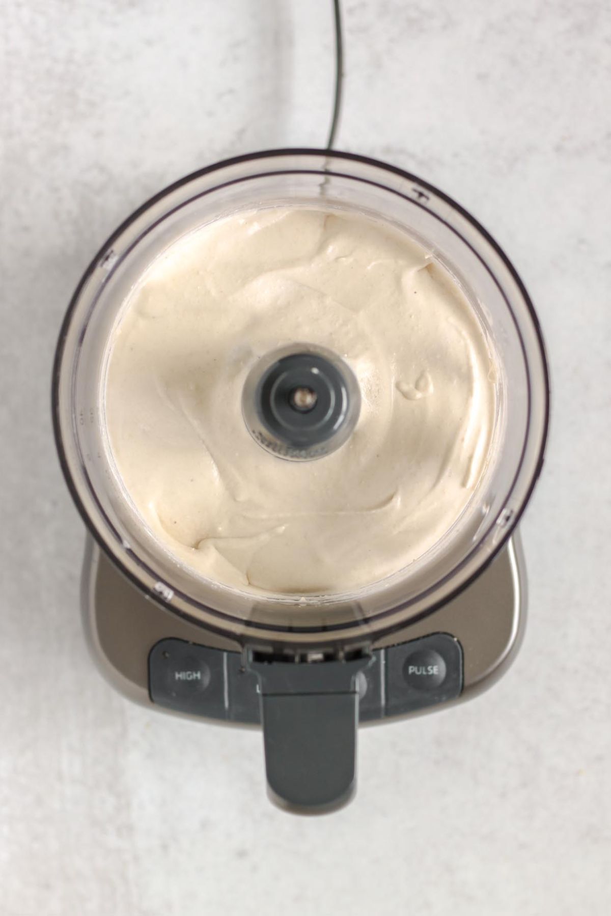 Coconut cream filling in a food processor.