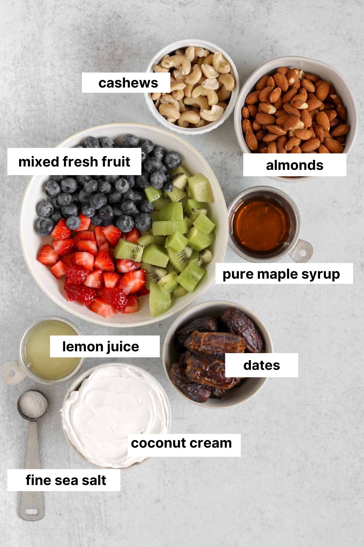 Labeled ingredients needed for vegan no-bake fruit tarts.