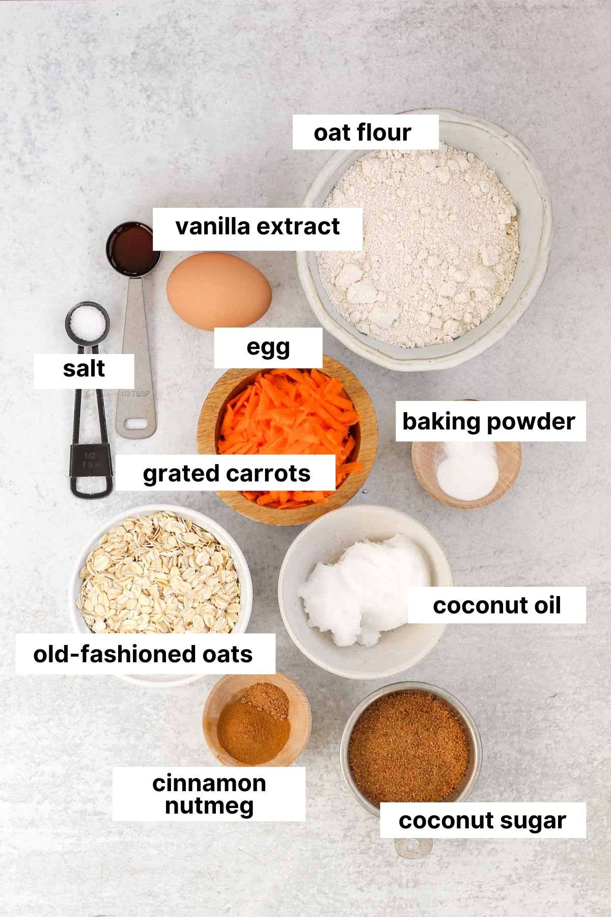 Labeled ingredients needed for carrot cake oatmeal cookies.