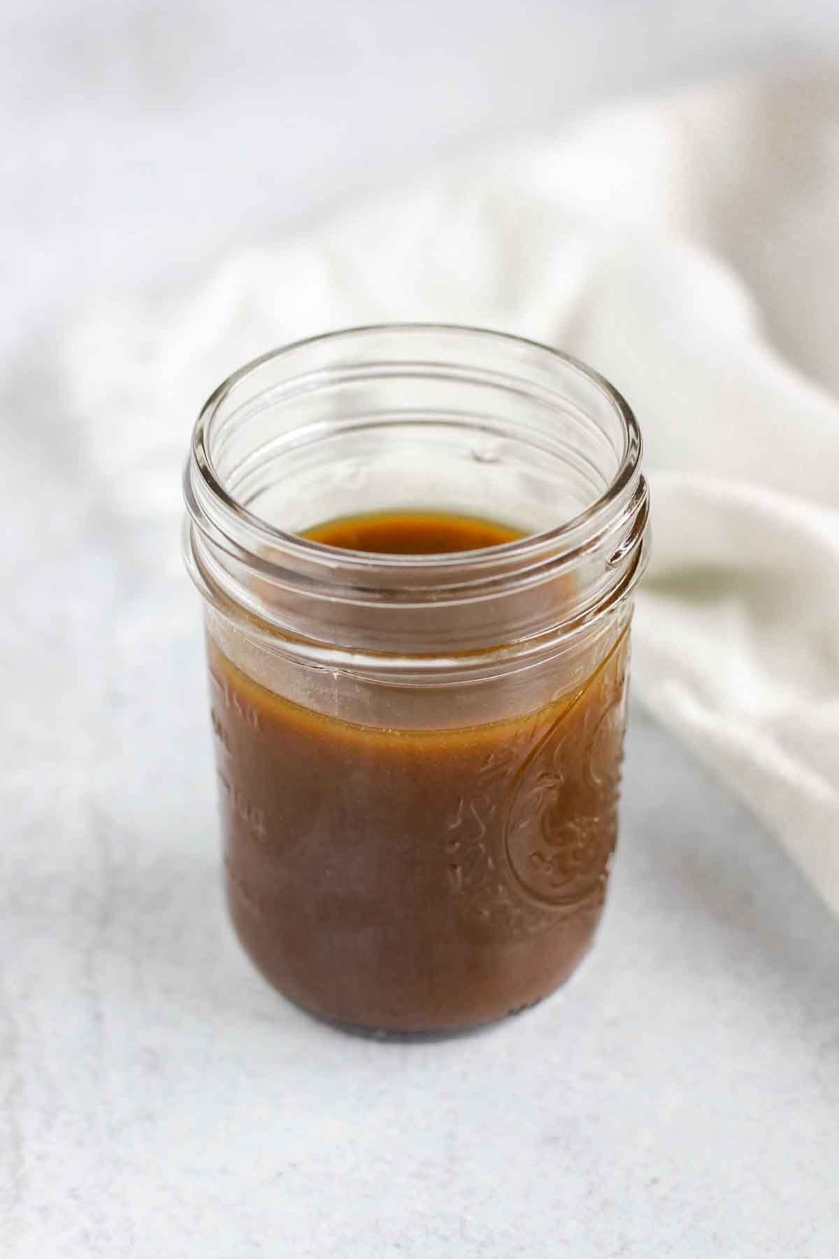 Balsamic vinaigrette dressing in a mason jar.