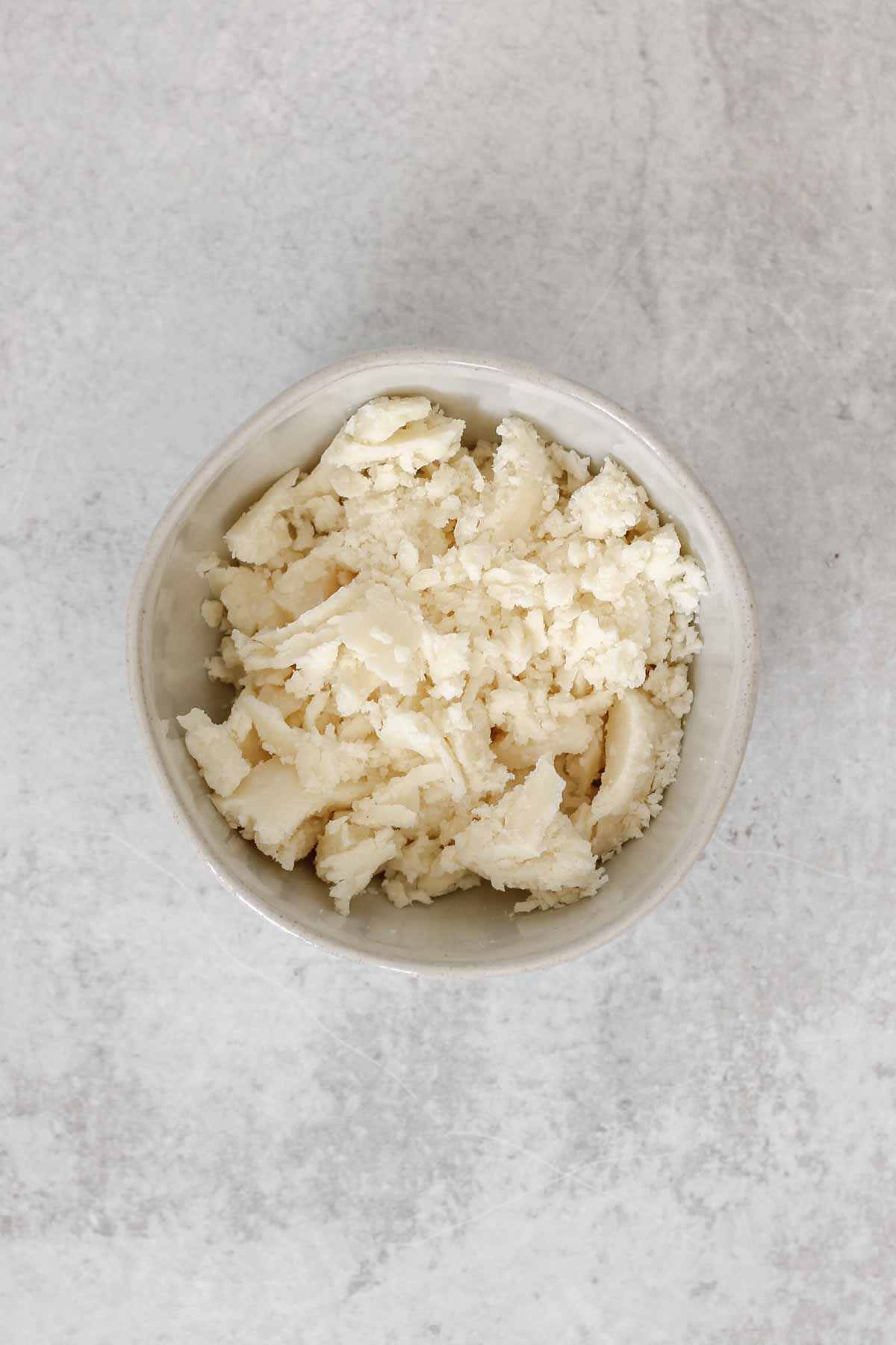 Coconut butter in a small ceramic bowl.