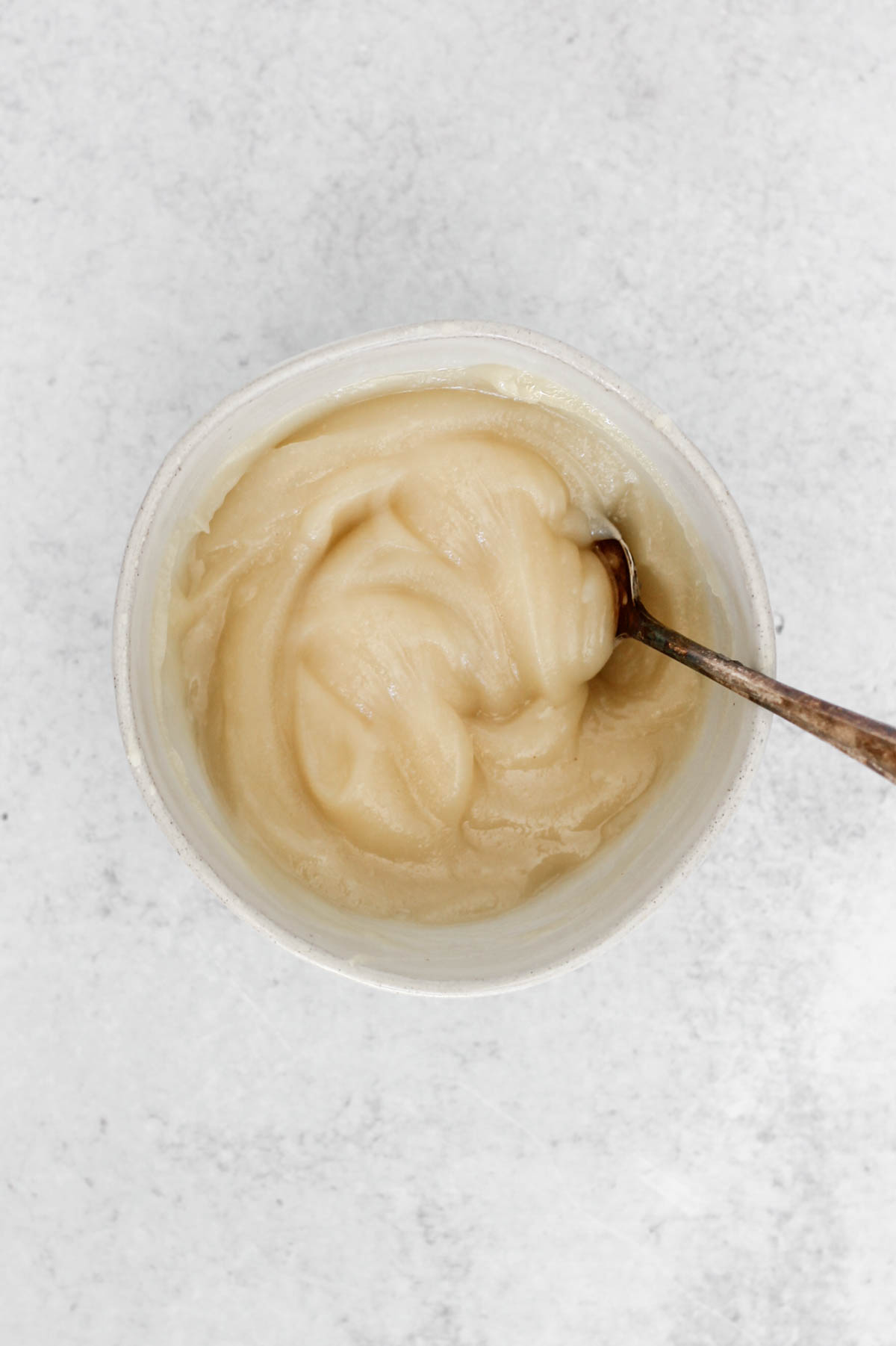 Melted coconut butter mixed with maple syrup.