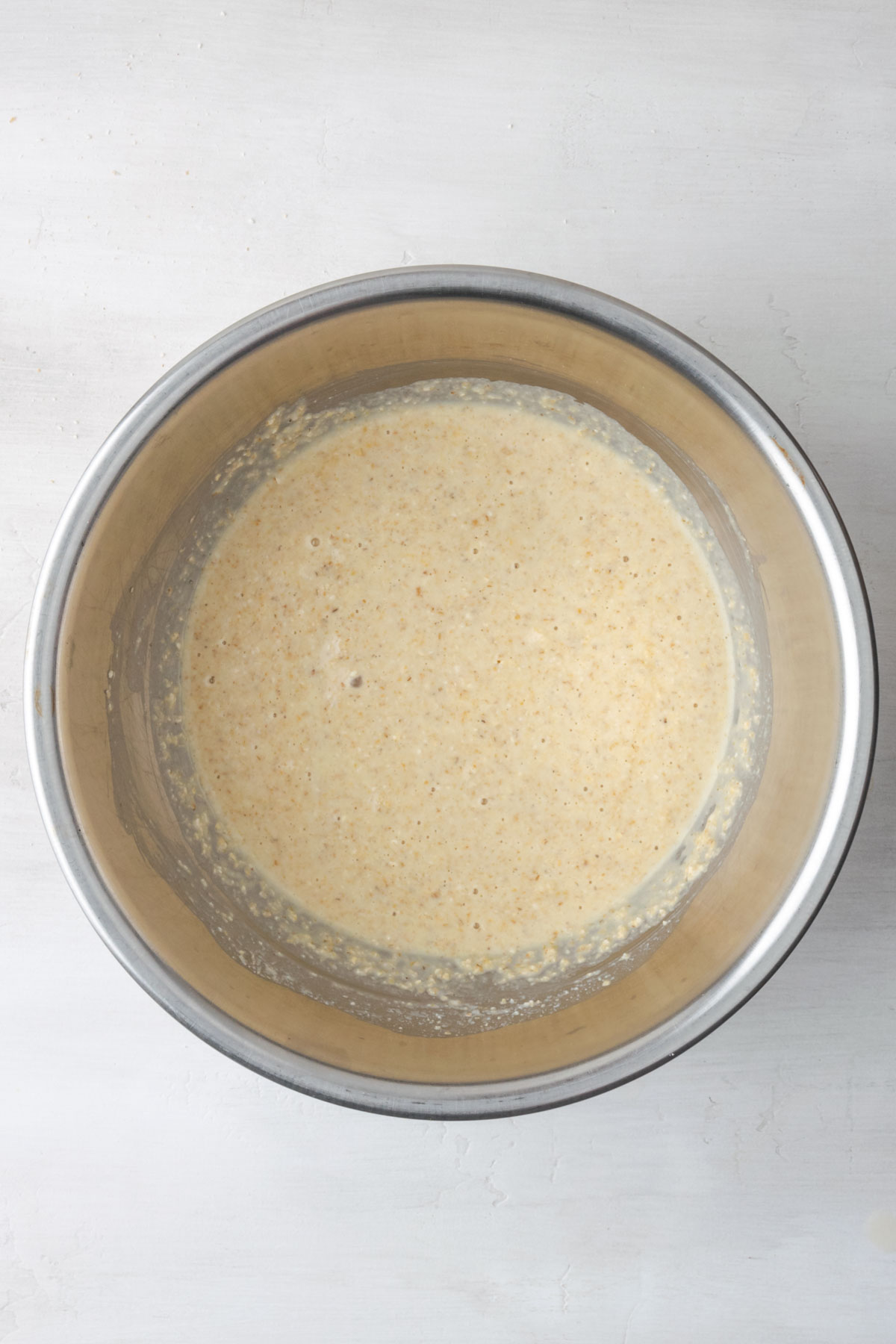 Oat flour pancake batter in a mixing bowl.