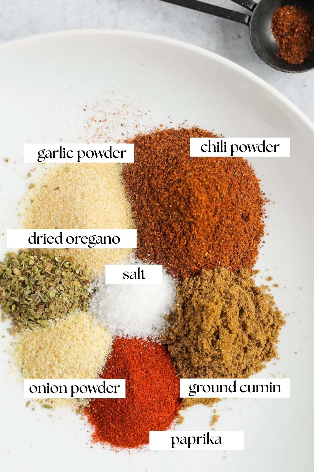 Labeled ingredients for clean eating taco seasoning.