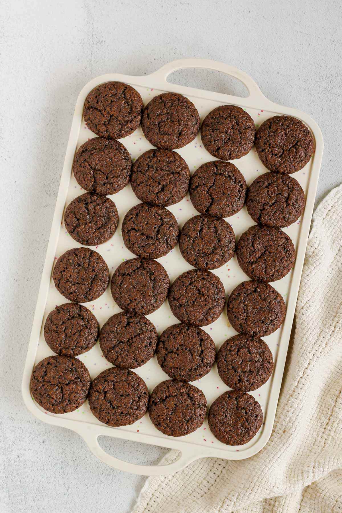 Mini chocolate flax muffins baked in a silicone 24-cup muffin pan.